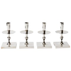 Set of Four Candle Sticks by Tommi Parzinger for Dorlyn Silversmiths