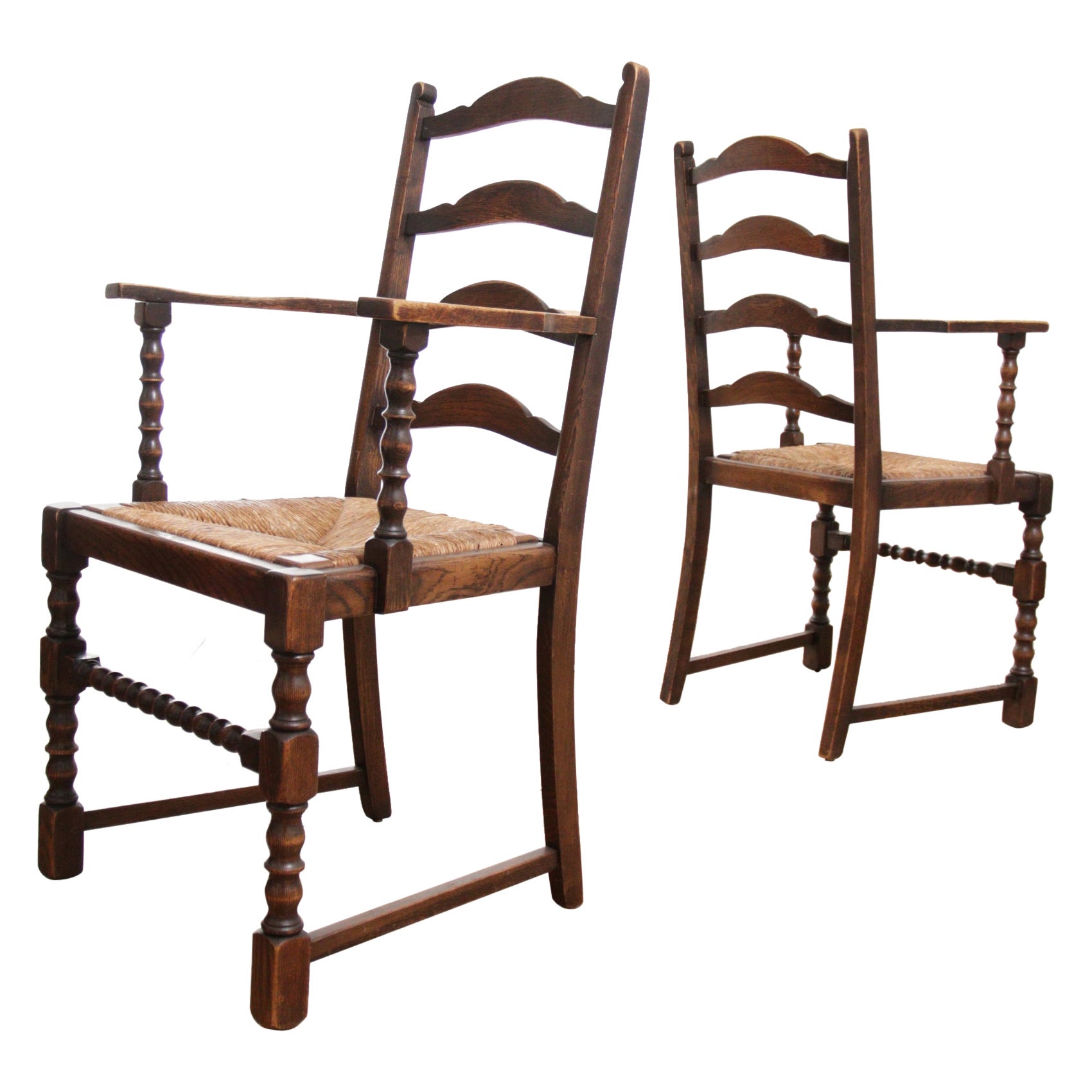 2 English Bobbin Ladder Back Oak Rush Seat Armchairs For Sale