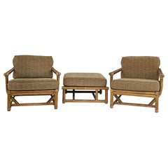 McGuire Rattan, Rawhide Upholstered Club Chairs and Ottoman, 1980s
