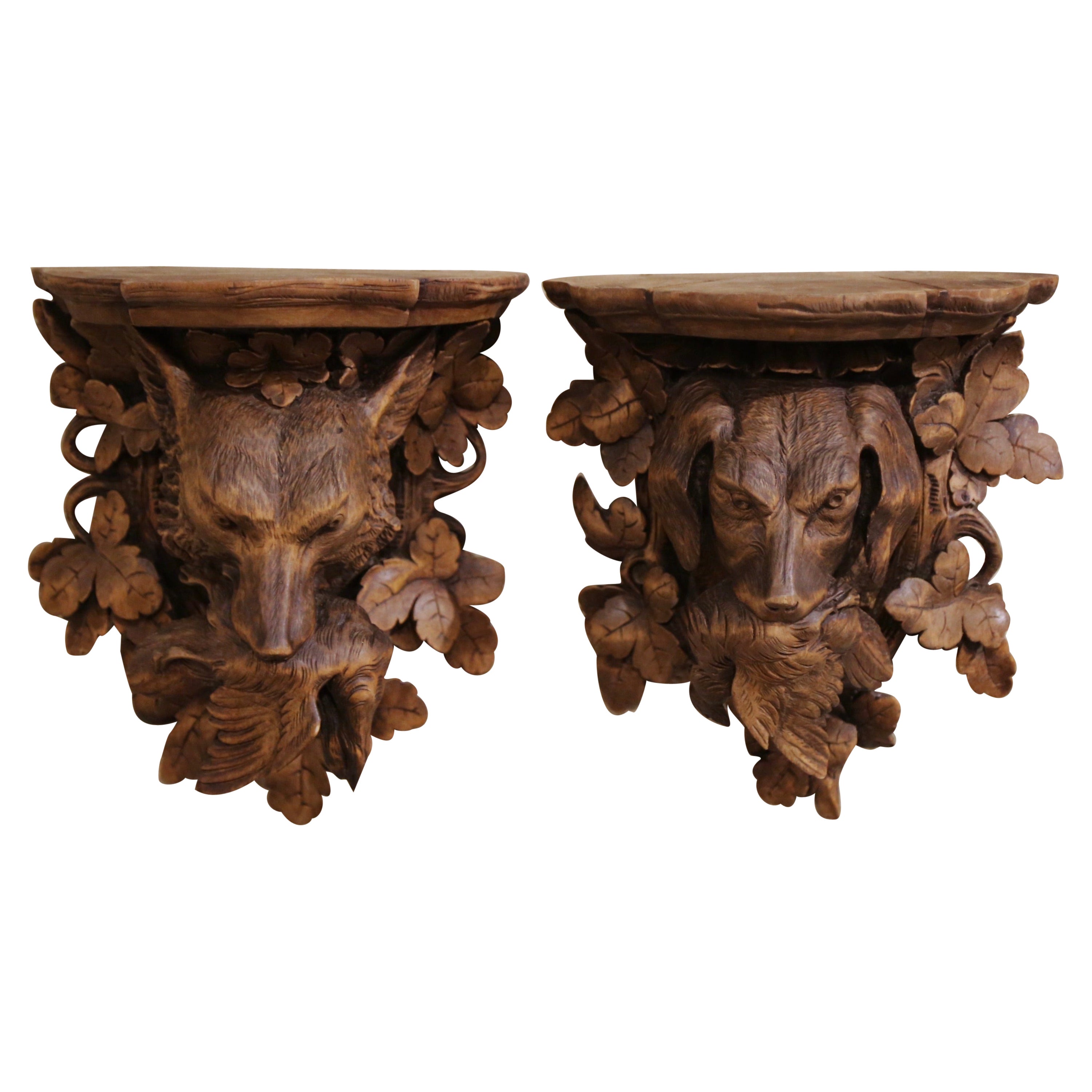 Pair of 19th Century French Black Forest Carved Walnut Hanging Shelves with Dog
