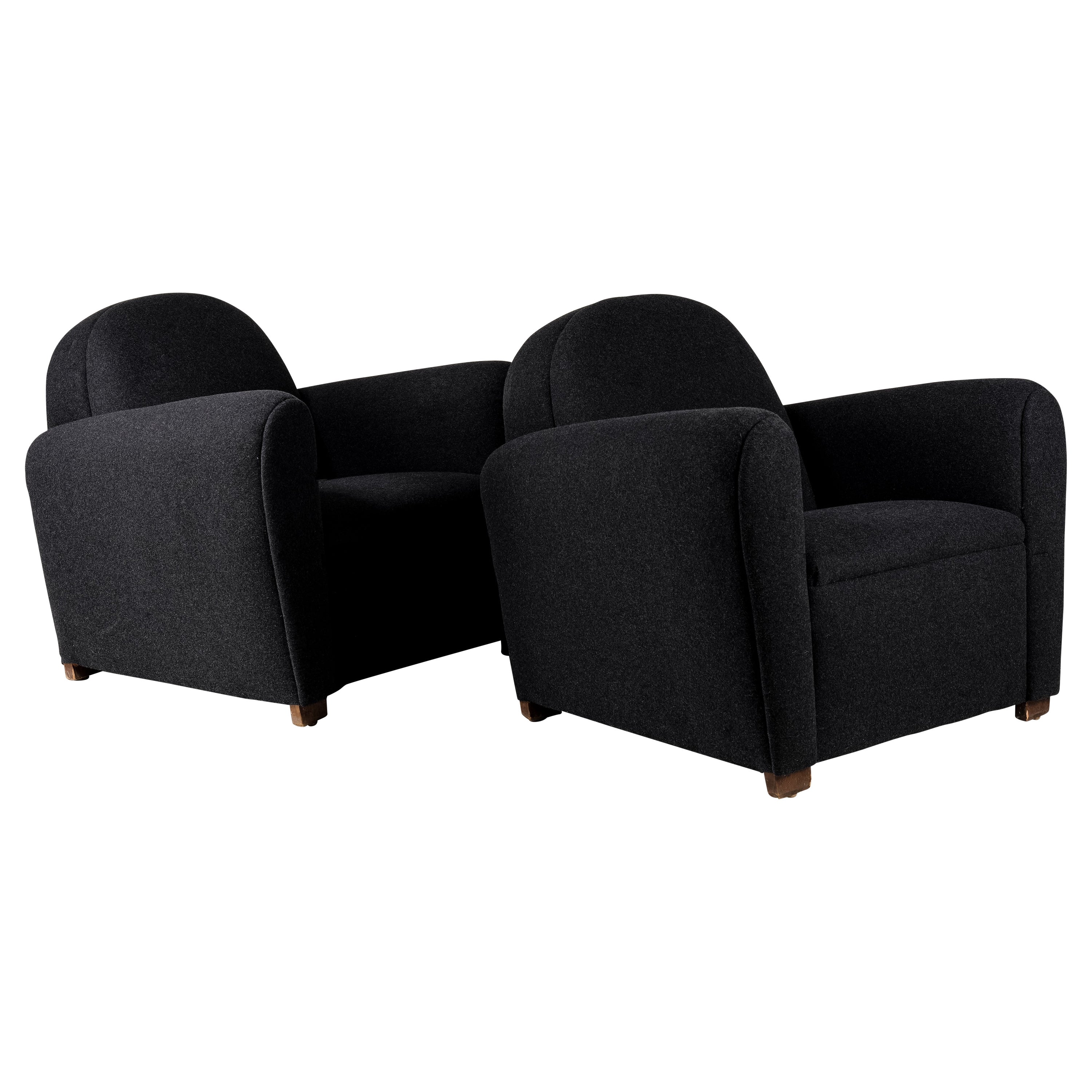 Presenting a sophisticated pair of Art Deco club chairs that exude timeless elegance and style. Inspired by the works of renowned furniture designer Jacques Adnet, these chairs reflect the glamour and artistic flair of the 1930s.

These Art Deco