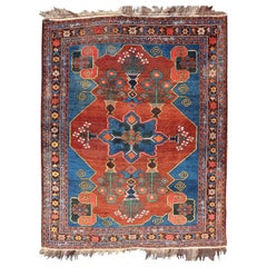 Antique N.W. Tapis persan avec motifs géométriques en terre cuite rouge, bleu royal et vert