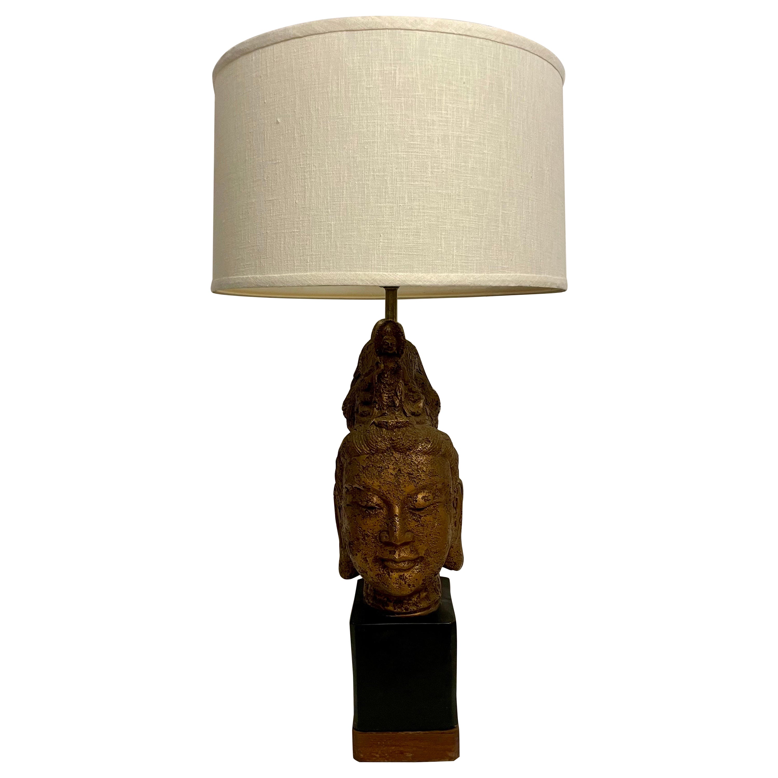 James Mont gold Buddha lamp the pieces are molded plaster with an antiqued, gold finish. And have polished brass hardware. Measures: 29