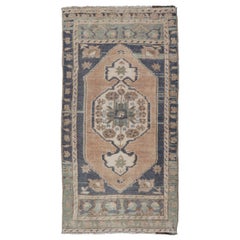 Vintage Turkish Oushak Rug with All-Over Sub-Geometric Medallion Design 