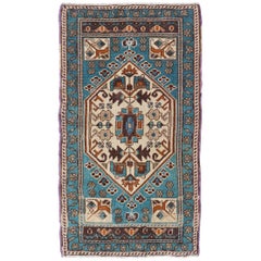 Tapis turc vintage Oushak de couleur sarcelle avec motif de médaillon géométrique