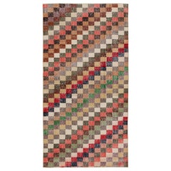 Alfombra vintage Zeki Müren con motivos geométricos policromados de Rug & Kilim
