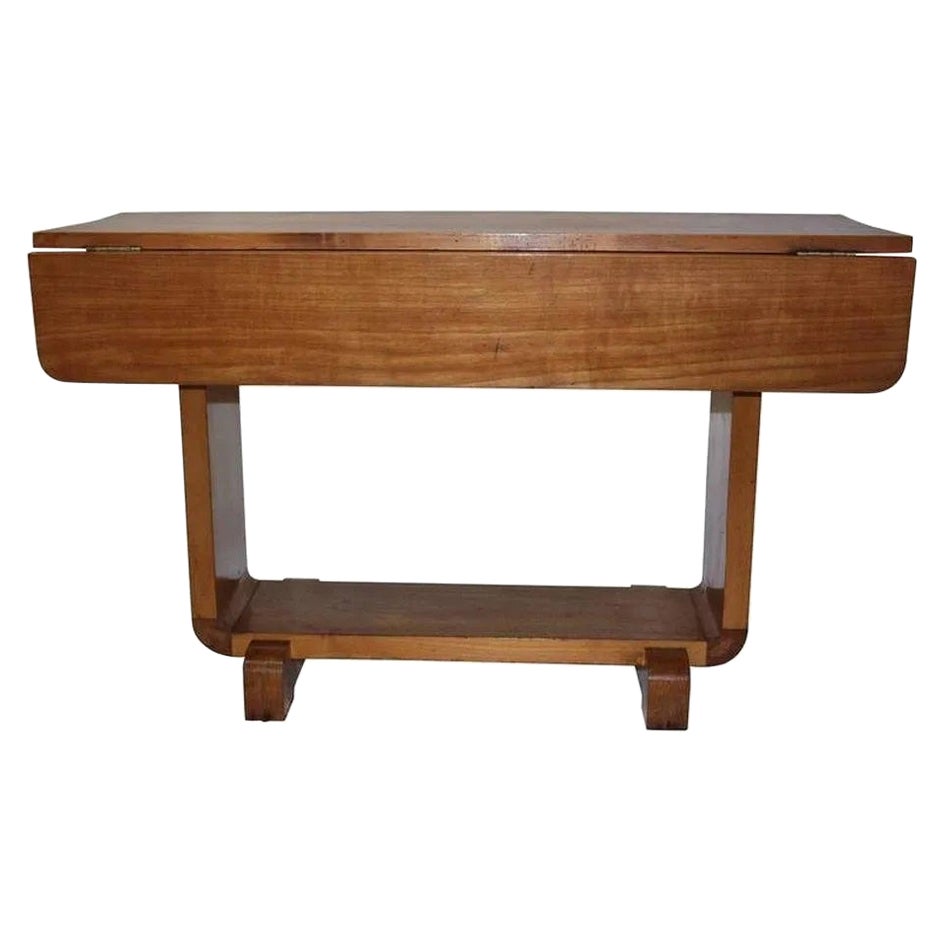 Shirley Temple's Art Deco blonde wood drop-leaf childs table.
circa 1935 Shirley used this table in her special bungalow on the 20th century fox and as a child.
This piece has remained in her collection from childhood.

Measurements of both drop