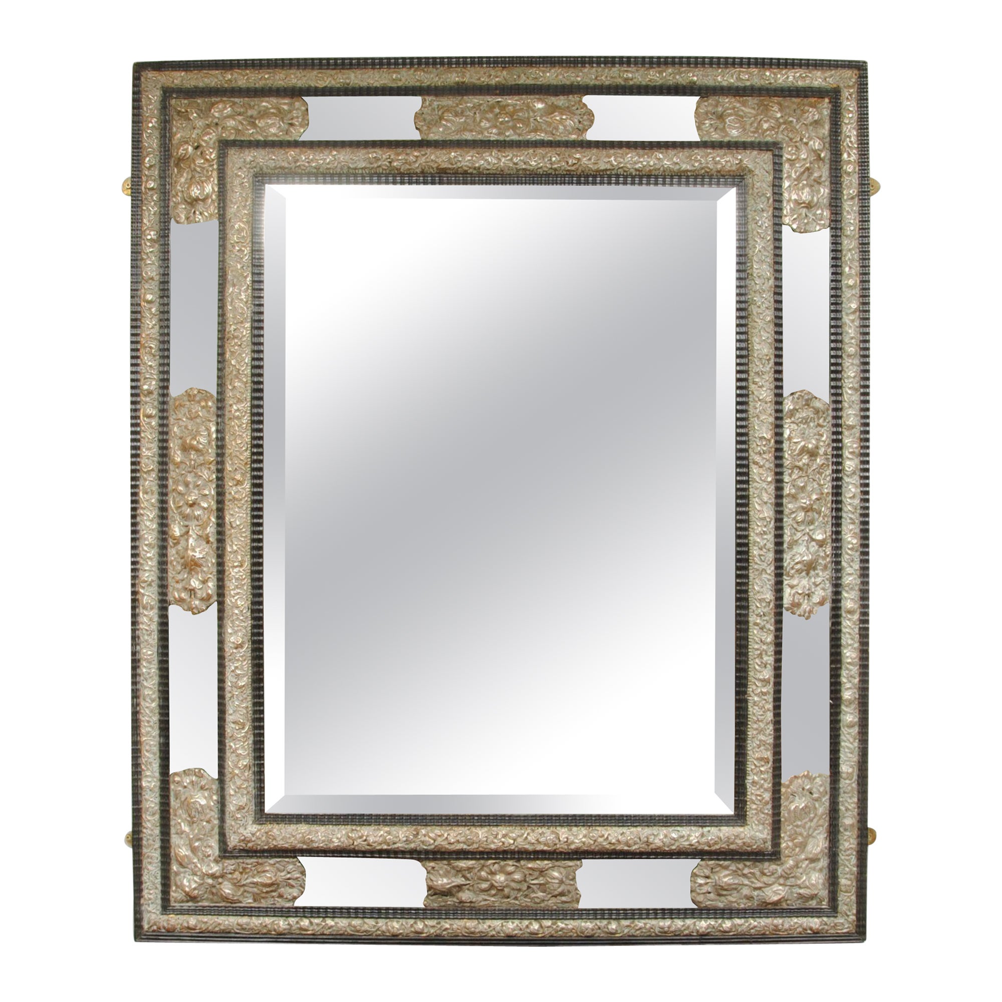 Grand miroir flamand à coussin en ébène avec décoration argentée