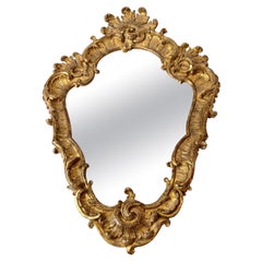 Antique Elegant French Rococo Mirror with original gilding from Mid-18th Century