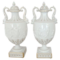Antique White and Gilt Capodimonte Porcelain Urns with Lids and Putti Decoration