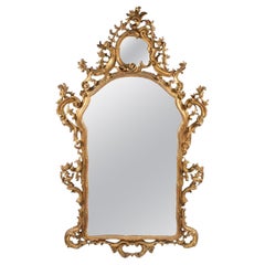 Italian Giltwood Mirror with Floral and Urn Carving