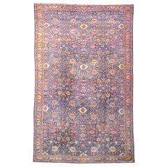 Tapis persan ancien de Hereke, vers 1900