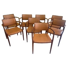 Set of Eight Danish Modern Rosewood Model 65 Arm Chairs by Niels Moller