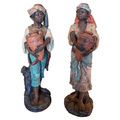 Paire de sculptures anciennes en terre cuite peintes à la main et numérotées