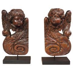 Pair of Small 17th Century Walnut Wood Angel Sculptures from France