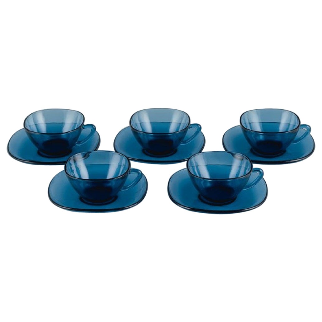 Vereco, France, Set of Five Teacups and Matching Saucers in Blue Glass. 