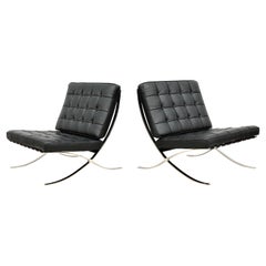 Modernism Ludwig Mies van der Rohe Black Leather Barcelona Lounge Chairs, a Pair