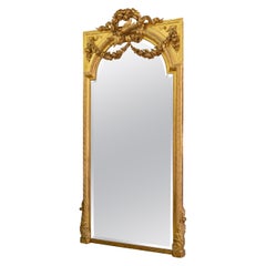 Important 19th Century Gilded and Stuccoed Wood Pediment Mirror