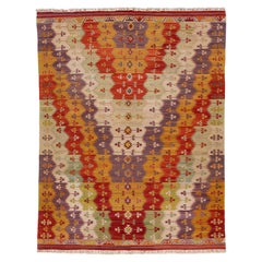 Tissage plat multicolore  Tapis Kilim en laine au design géométrique moderne