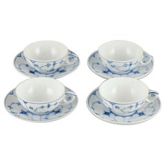Four Sets of Royal Copenhagen Blue Fluted Plain Tea Cups and Saucers