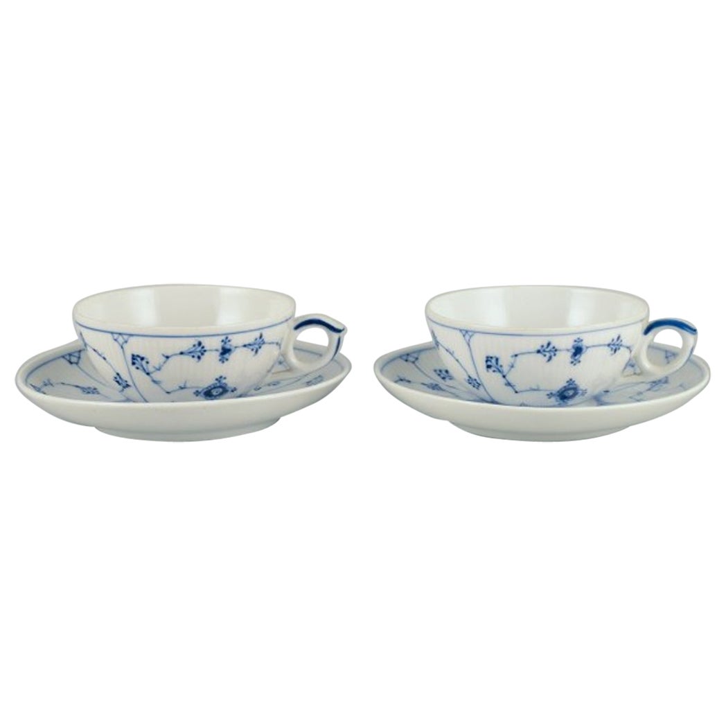 Two Sets of Royal Copenhagen Blue Fluted Plain Tea Cups and Saucers