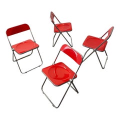 Set of Four Giancarlo Piretti 'Plia' Folding Chairs in Red