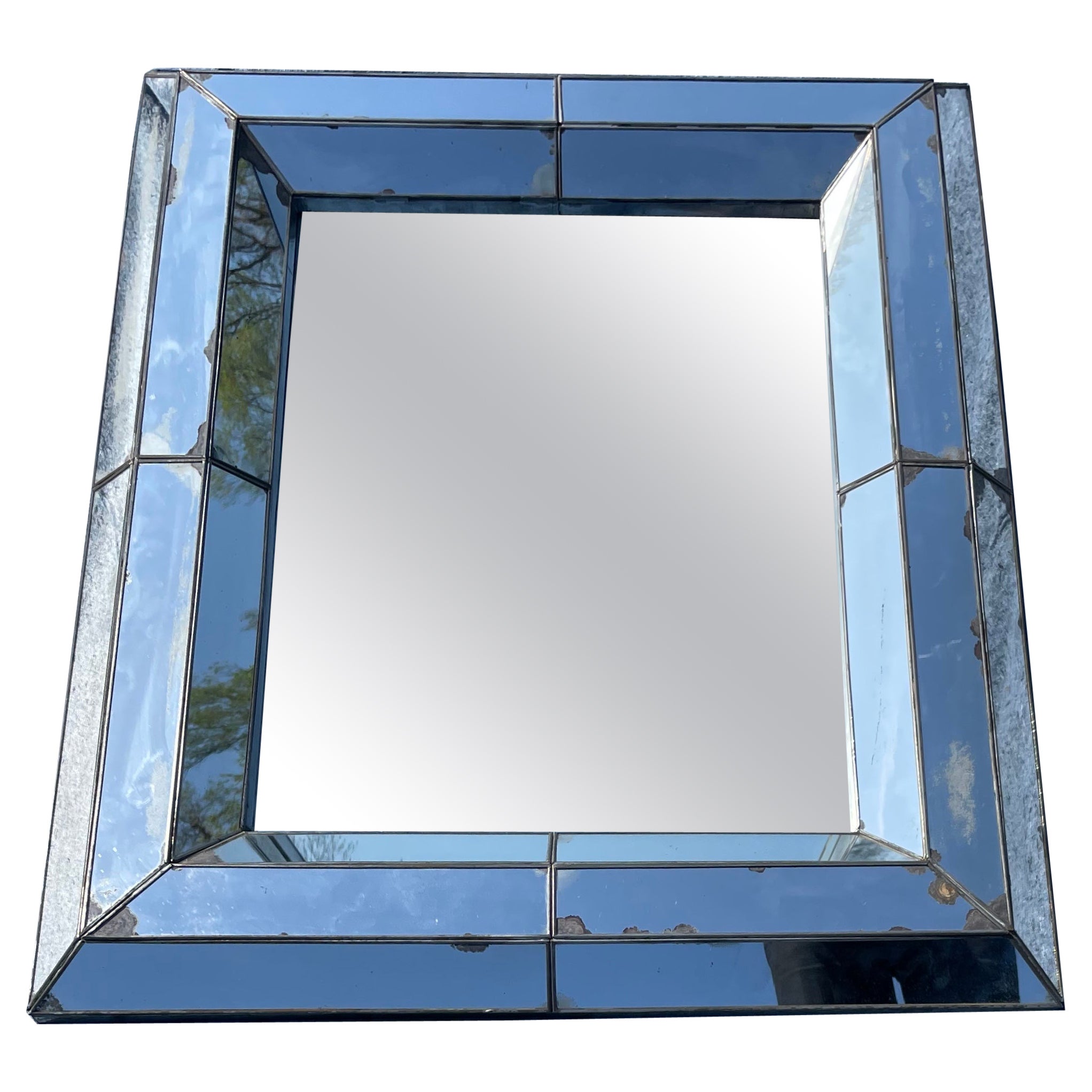 Grand miroir de style vénitien en verre mercuré