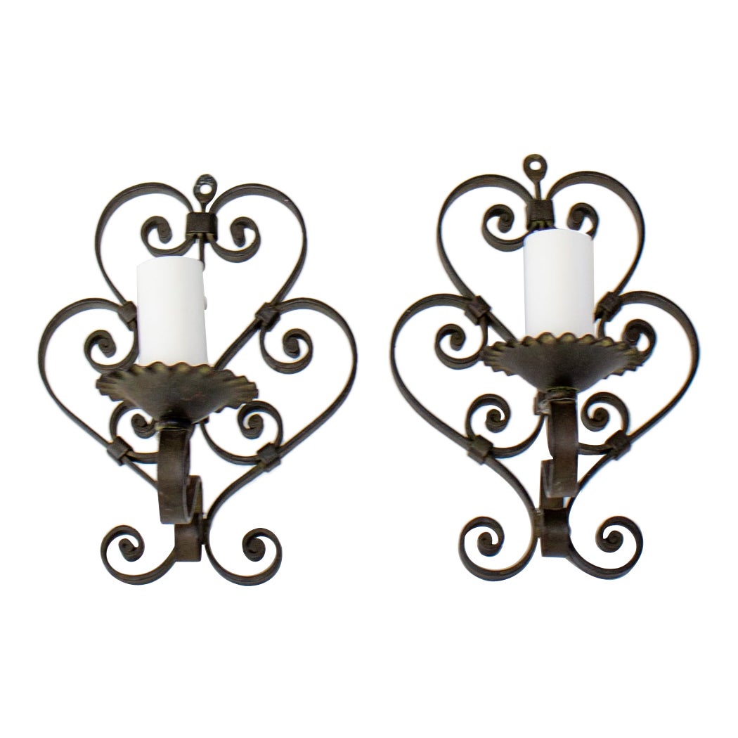 Early 20th Century Wrought Iron Pin Up Sconces, a Pair For Sale
