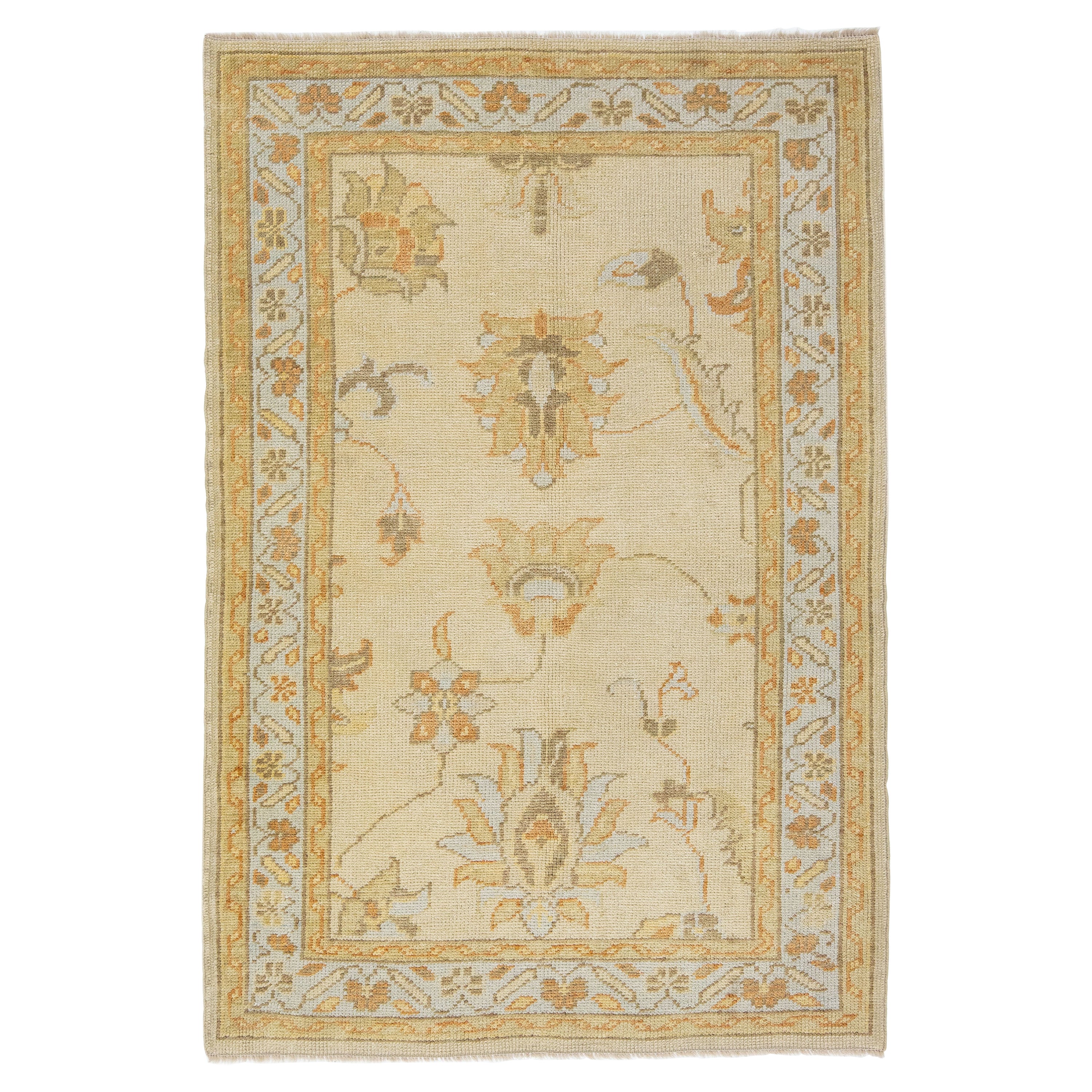 Beige Scatter Turkish Oushak Wool Rug Handmade with Floral Motif For Sale