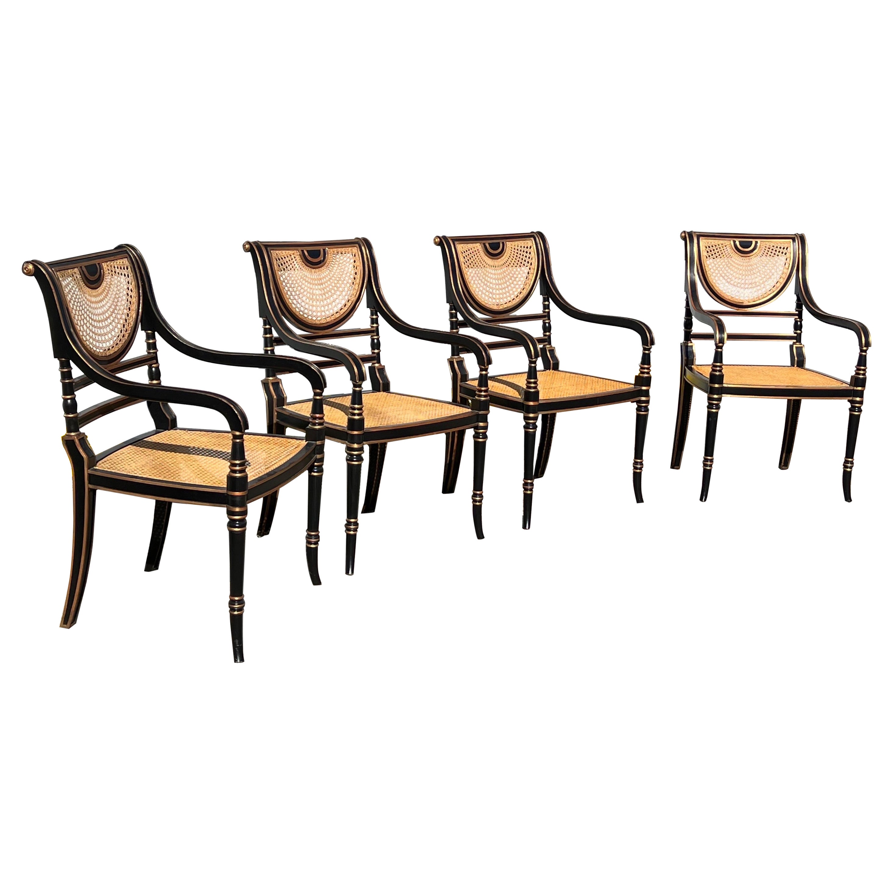 Un ensemble de 4 fauteuils cannés de style Regency de Smith & Watson 