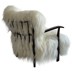 Vintage 1940s Fritz Hansen Easy Chair Reupholstered in long haired Icelandic Sheepskin.