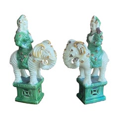 Pair of Chinese Figures Seated on Elephants