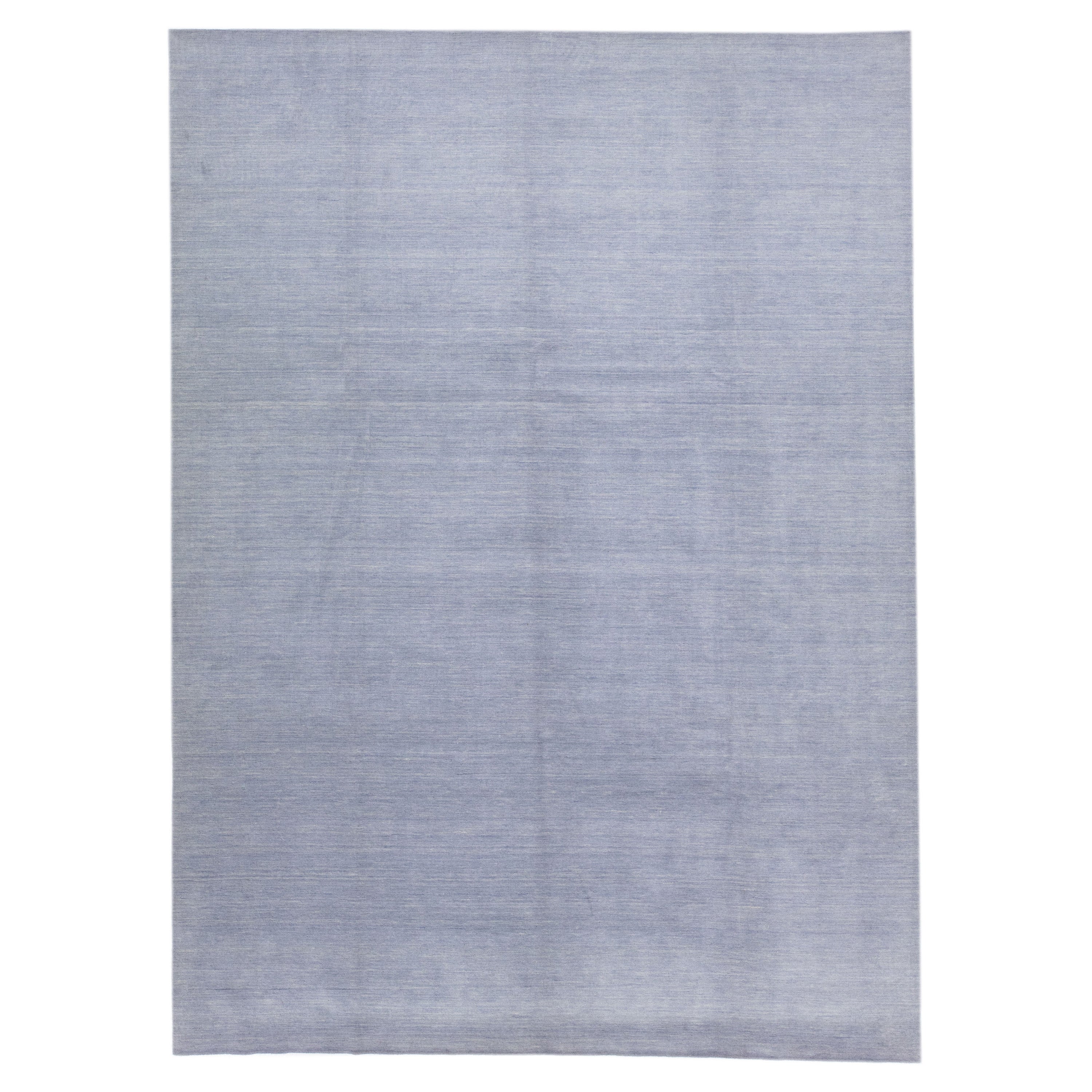 Modern Gabbeh Style Wool Rug Handmade with a Solid Blue Field For Sale