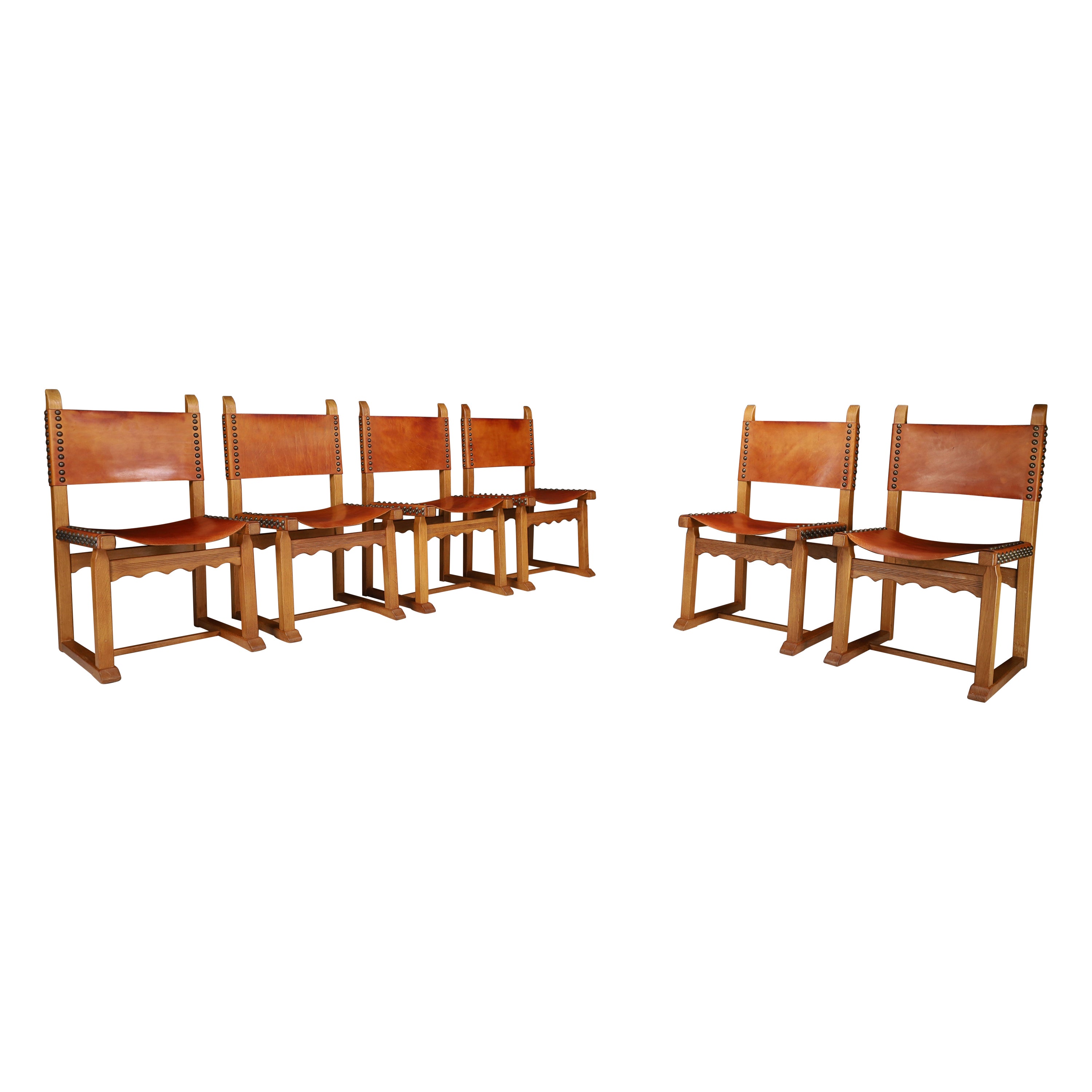 Chaises de salle à manger en chêne et cuir cognac, France, années 1960 en vente