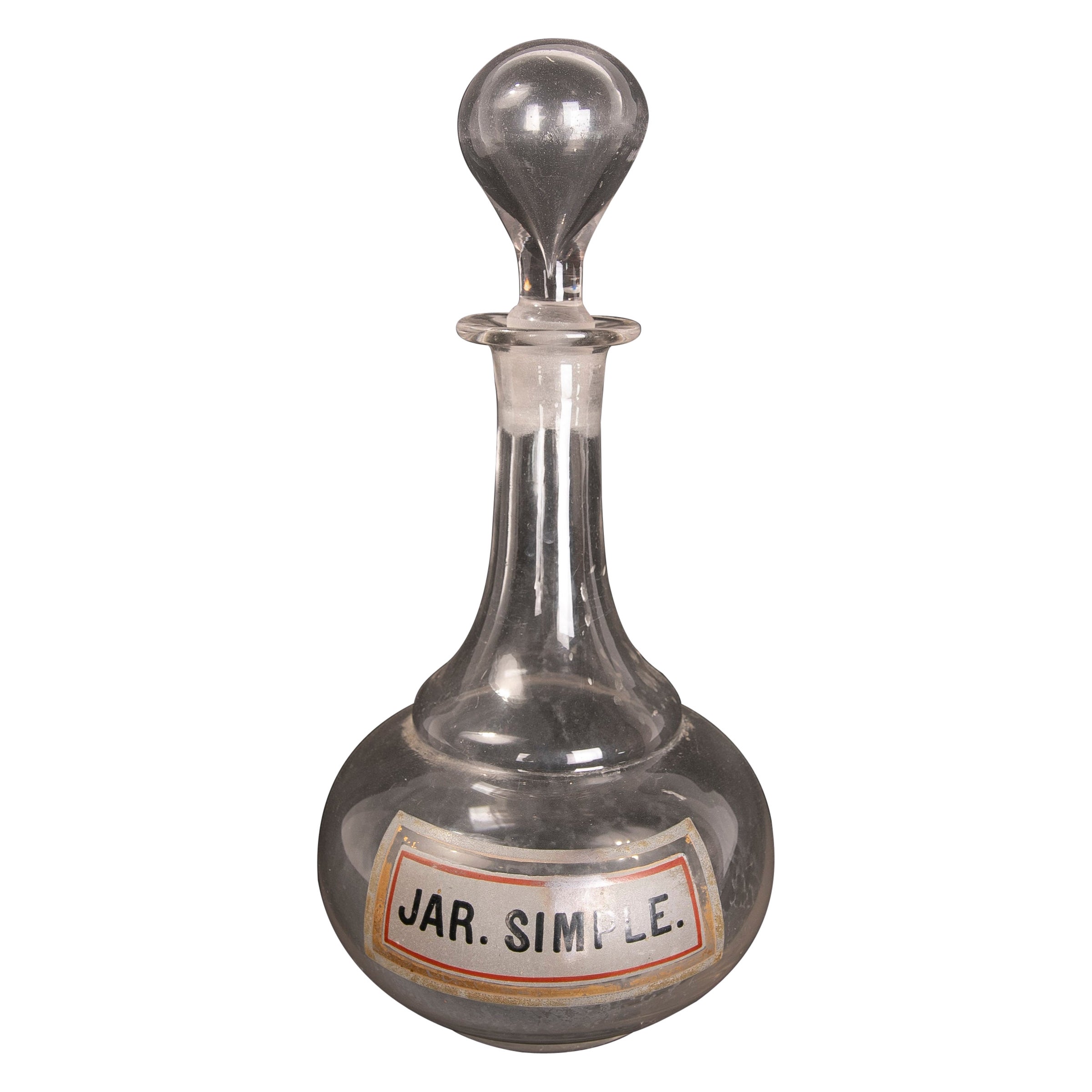 Pharmacy-Glasflasche des 19. Jahrhunderts mit bemalter Inschrift „Jar SImple“.