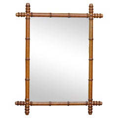 Antique French 1920s Faux Bamboo Walnut Mirror with Protruding Corners and Brown Patina