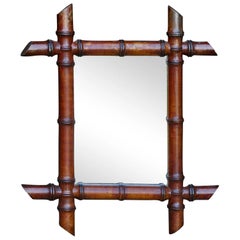 Antique Petite French Faux Bamboo Walnut Mirror circa 1920 with Slanted Accents