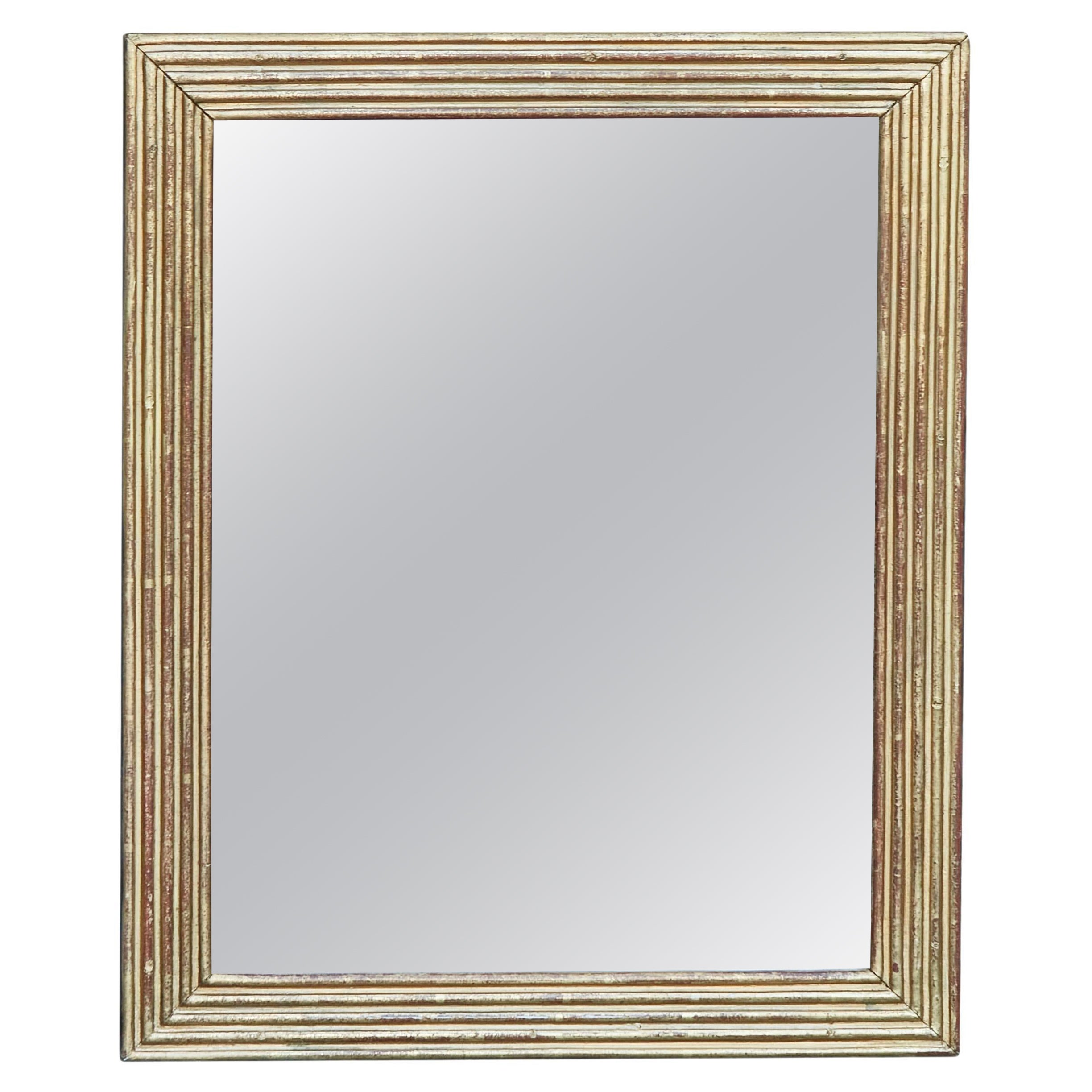 French 19th Century Giltwood Rectangular Mirror with Carved Reeded Accents For Sale