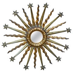 Midcentury French Giltwood Sunburst Mirror with Star and Cloud Motifs