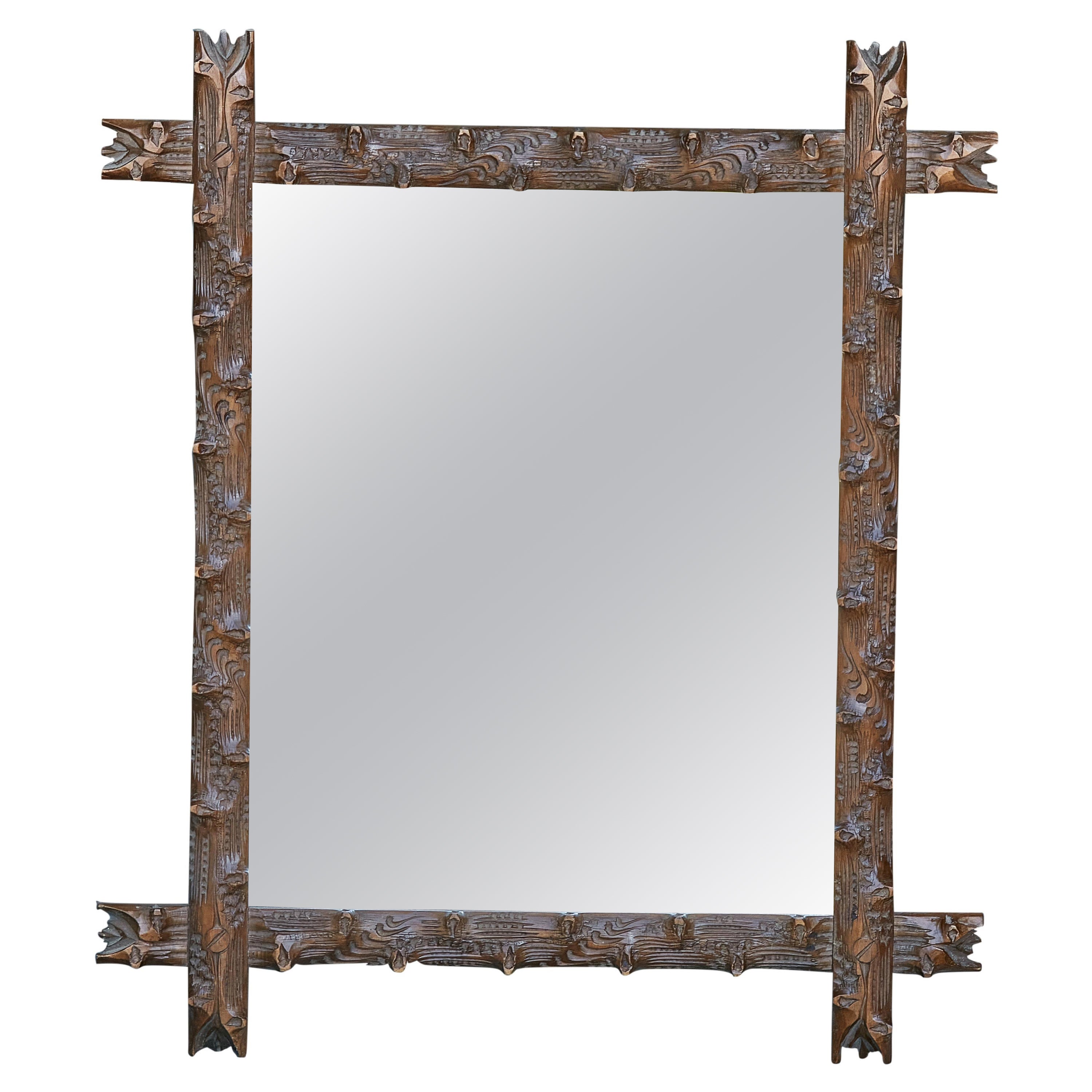 Black Forest 19th Century Wooden Mirror with Hand-Carved Wooden Frame For Sale