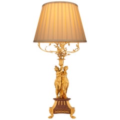 Lampe en bronze doré et marbre rouge griotte d'époque Belle Époque du XIXe siècle