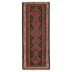 Kilim persan vintage noir et rouge à motifs géométriques
