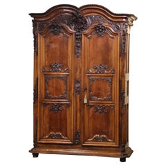 18th Century French Louis XV Carved Walnut Armoire from Lyon