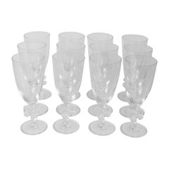 Set of twelve fun and elegant Marc Aurel water glasses with jigsaw stem