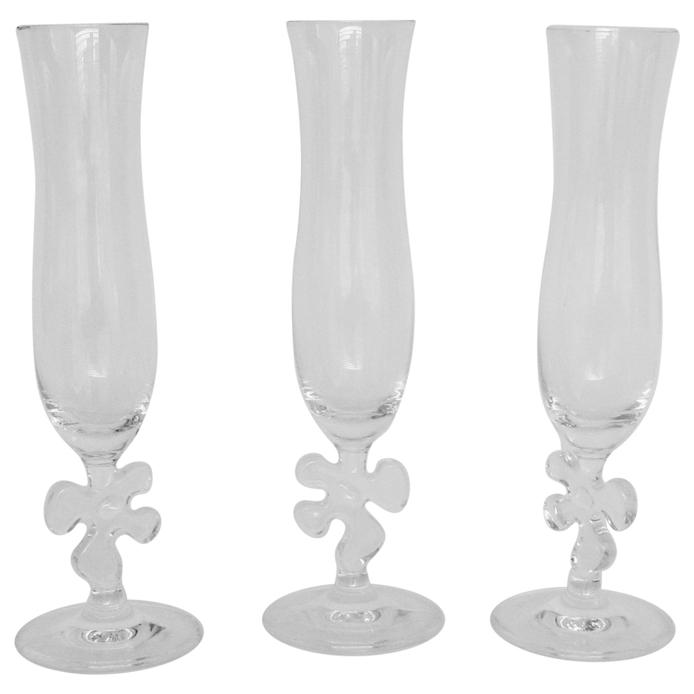 Ten Fun and Fancy Marc Aurel Crystal Champagne Flutes with Puzzle Piece Stem For Sale