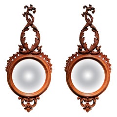 Pair of Polychromed Rounds Wall Mirrors in Shades of Red