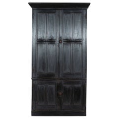 Grande armoire de ménage en pin anglais ébonisé du 19e siècle