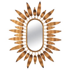 Sunburst Oval Mirror in Gilt Metal with Foliage Frame