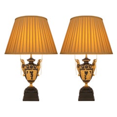 Paire de lampes de style Renaissance française du 19ème siècle en bronze, bois fruitier et bronze doré