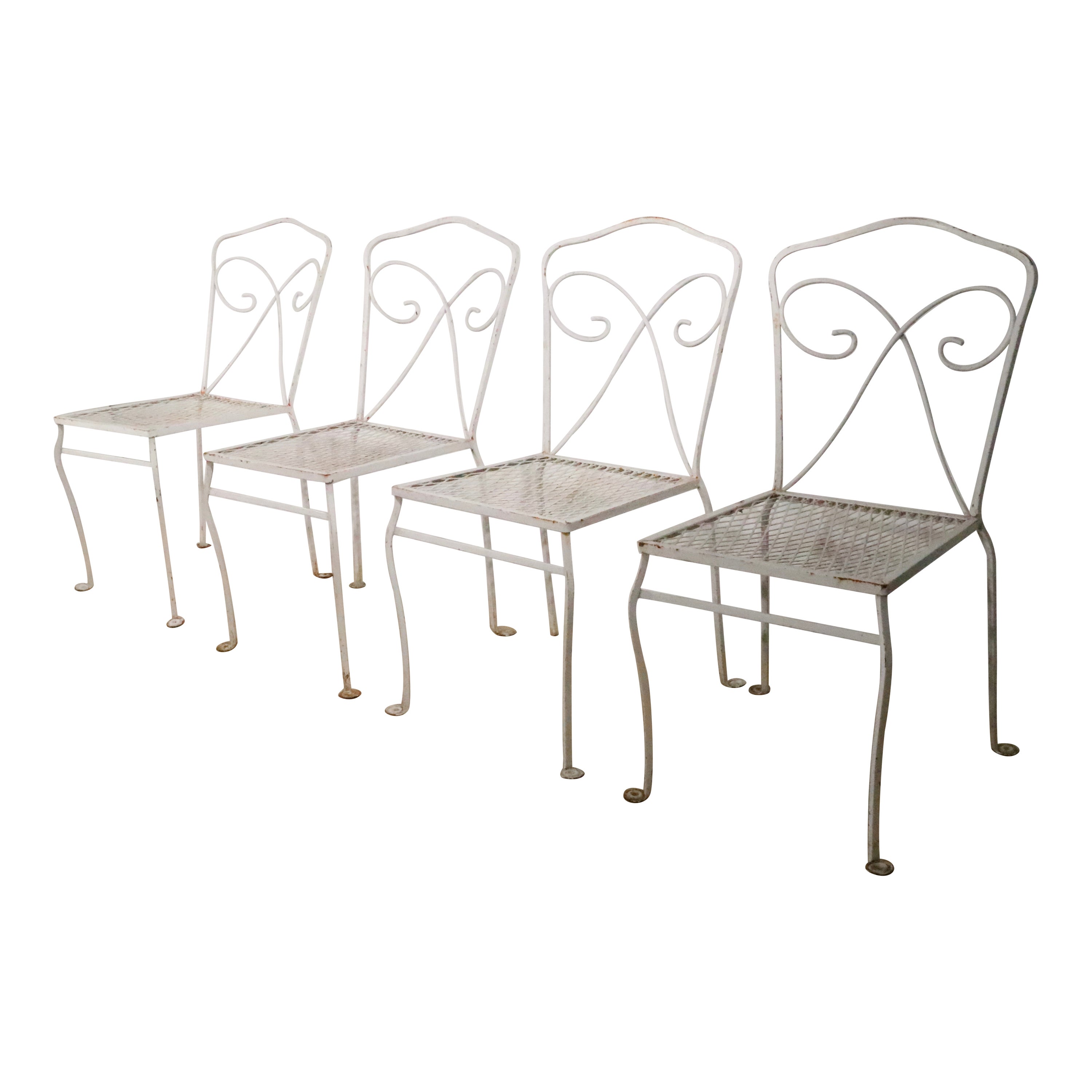 Ensemble de quatre chaises de jardin en fer forgé probablement de Woodard vers les années 1950/1970  en vente